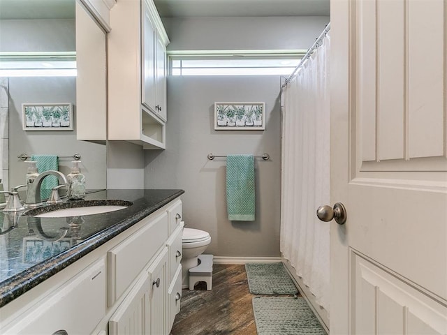 2395 County Road 1260, Blanchard, OK 73010 - bathroom with vanity, wood finished floors, and a shower with shower curtain