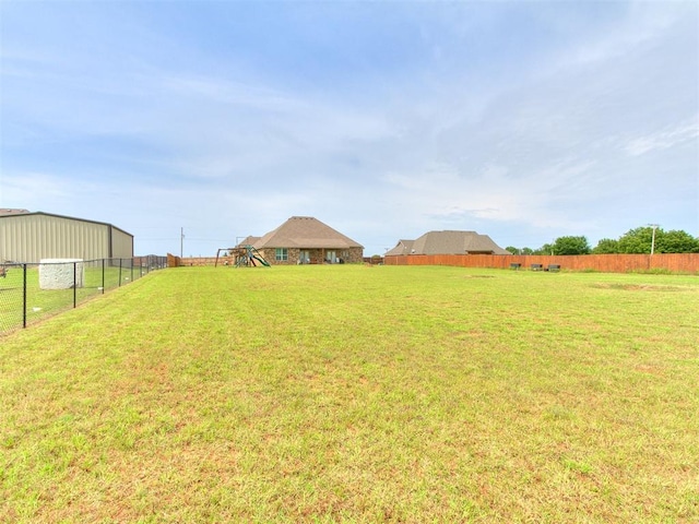 2395 County Road 1260, Blanchard, OK 73010 - view of yard featuring a playground