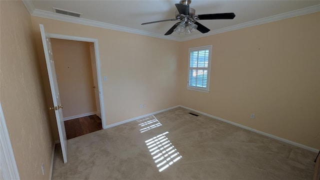3957 N 58th Ter, Oklahoma City, OK 73112 - carpeted spare room featuring ornamental molding and ceiling fan