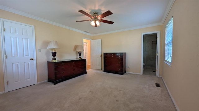 3957 N 58th Ter, Oklahoma City, OK 73112 - bedroom with crown molding, light carpet, a ceiling fan, and ensuite bathroom