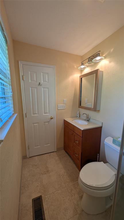3957 N 58th Ter, Oklahoma City, OK 73112 - bathroom with vanity and toilet