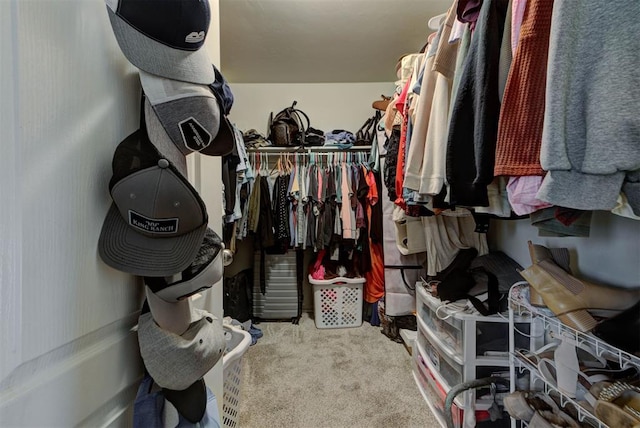 11704 NW 135th Ter, Piedmont, OK 73078 - walk in closet featuring carpet