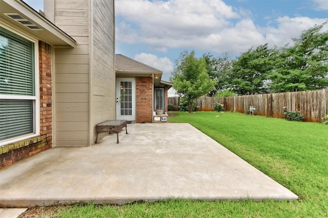 8517 SW 36th Ter, Oklahoma City, OK 73179 - fenced backyard featuring a patio