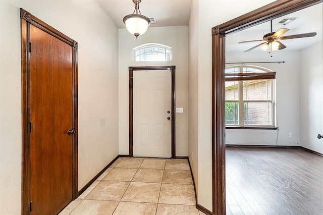 2524 Faint Ridge Way, Piedmont, OK 73078 - foyer entrance featuring ceiling fan and baseboards