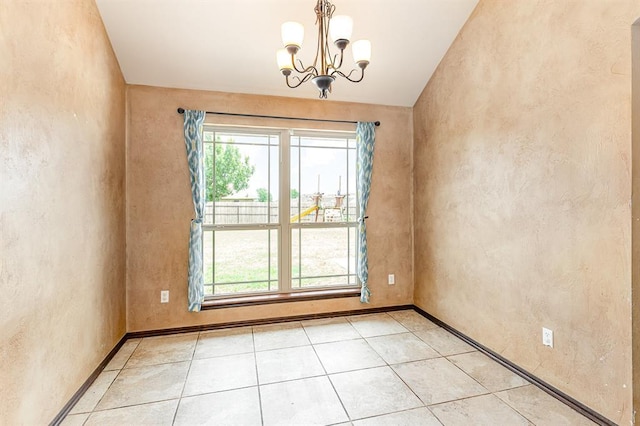 2524 Faint Ridge Way, Piedmont, OK 73078 - unfurnished room featuring a chandelier, light tile patterned floors, a textured wall, and vaulted ceiling