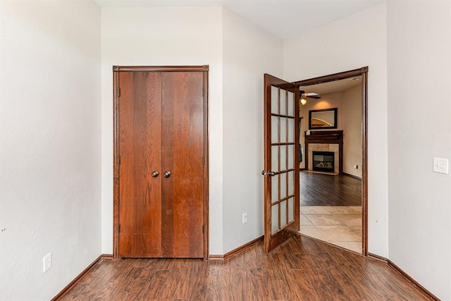 2524 Faint Ridge Way, Piedmont, OK 73078 - unfurnished bedroom featuring wood finished floors and a fireplace