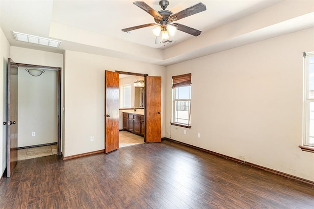 2524 Faint Ridge Way, Piedmont, OK 73078 - unfurnished bedroom with wood finished floors and ensuite bath