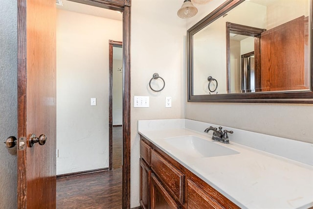 2524 Faint Ridge Way, Piedmont, OK 73078 - bathroom featuring vanity and wood finished floors