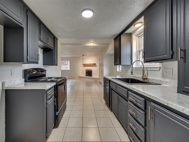 4821 Cinderella Dr, Oklahoma City, OK 73129 - kitchen featuring black appliances, a textured ceiling, light countertops, open floor plan, and light tile patterned floors