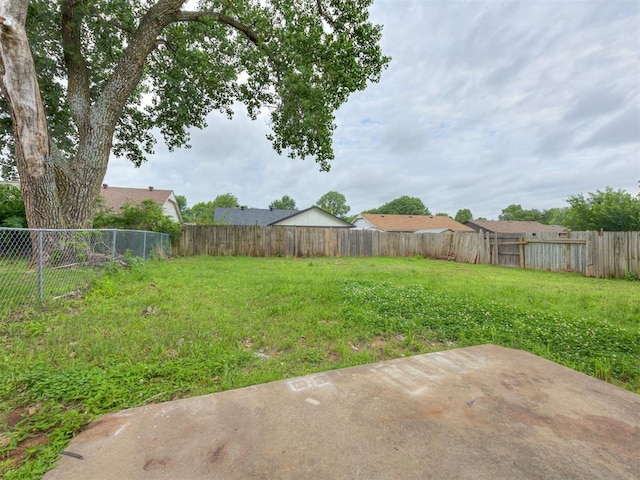4821 Cinderella Dr, Oklahoma City, OK 73129 - fenced backyard featuring a patio area