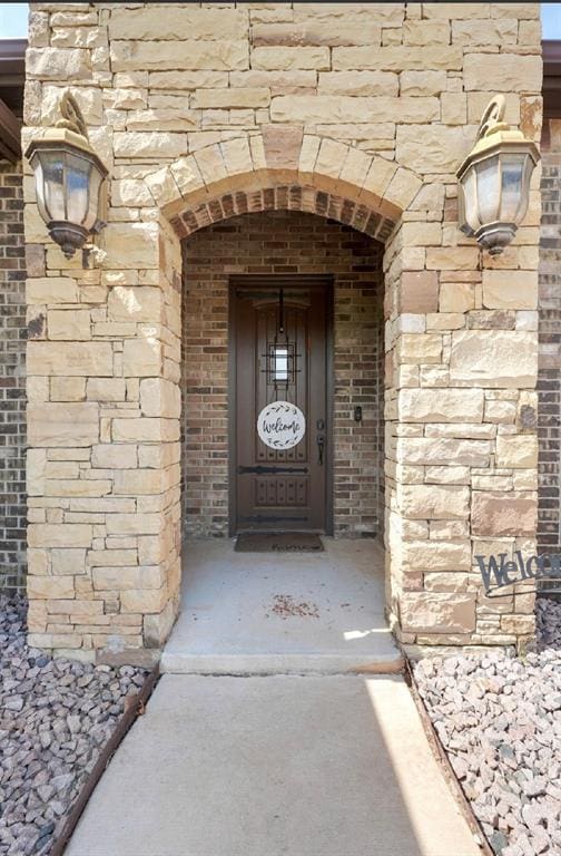 30202 Sleepy Hollow Dr, Mcloud, OK 74851 - entrance to property featuring brick siding and stone siding