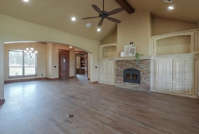 30202 Sleepy Hollow Dr, Mcloud, OK 74851 - unfurnished living room featuring arched walkways, beamed ceiling, a ceiling fan, wood finished floors, and a chandelier