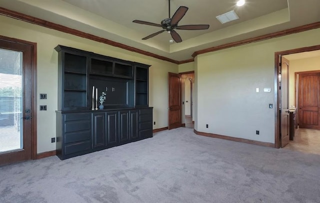 30202 Sleepy Hollow Dr, Mcloud, OK 74851 - unfurnished bedroom with light colored carpet, a raised ceiling, and ceiling fan