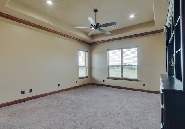 30202 Sleepy Hollow Dr, Mcloud, OK 74851 - spare room featuring a raised ceiling, light colored carpet, recessed lighting, and a ceiling fan