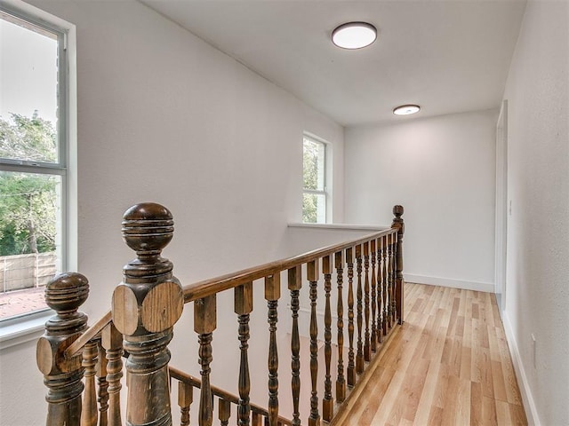 1231 NW 33rd St, Oklahoma City, OK 73118 - hallway featuring an upstairs landing and light wood-style flooring