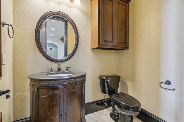 13209 Blue Canyon Cir, Oklahoma City, OK 73142 - half bathroom with vanity, tile patterned flooring, and a textured wall