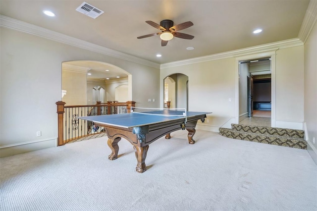 13209 Blue Canyon Cir, Oklahoma City, OK 73142 - playroom with ceiling fan, carpet, arched walkways, ornamental molding, and recessed lighting