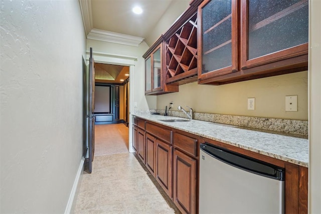 13209 Blue Canyon Cir, Oklahoma City, OK 73142 - kitchen featuring dishwasher, light stone counters, crown molding, and glass insert cabinets