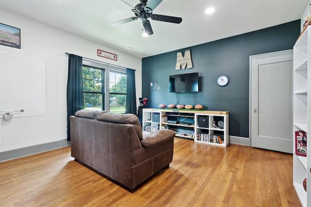1828 S 7th St, Chickasha, OK 73018 - living room featuring light wood-style floors and a ceiling fan