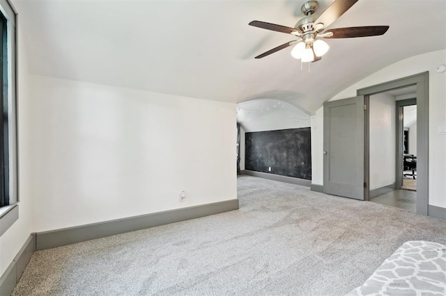 1828 S 7th St, Chickasha, OK 73018 - spare room with carpet floors, ceiling fan, and vaulted ceiling