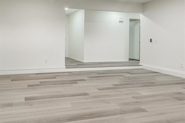 648 NW 18th St, Moore, OK 73160 - spare room featuring wood finished floors and baseboards