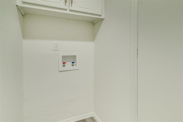 648 NW 18th St, Moore, OK 73160 - laundry area with cabinet space and hookup for a washing machine