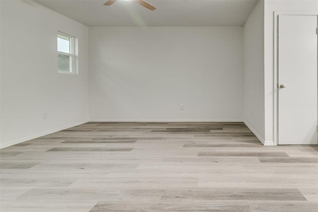 648 NW 18th St, Moore, OK 73160 - spare room featuring ceiling fan and light wood-style floors