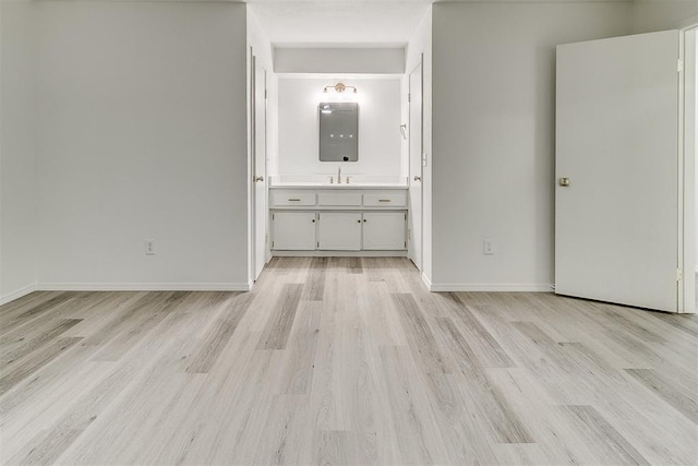 648 NW 18th St, Moore, OK 73160 - unfurnished bedroom featuring light wood finished floors and ensuite bathroom