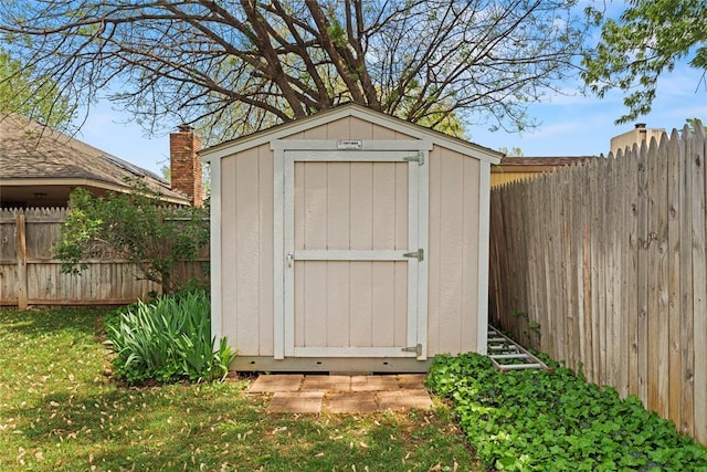 1912 Magnolia Ln, Edmond, OK 73013 - view of shed featuring a fenced backyard