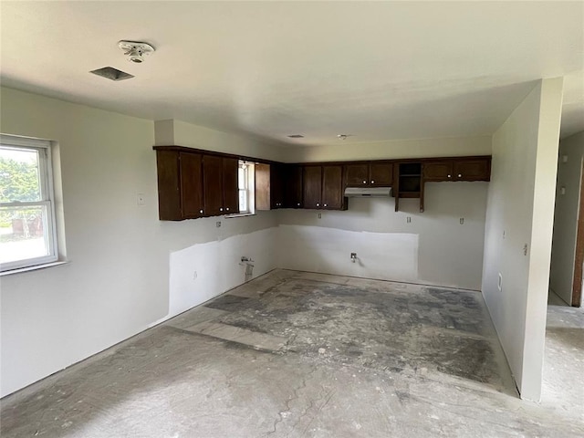 13090 County Road 1140, Lookeba, OK 73053 - kitchen featuring dark brown cabinets and under cabinet range hood