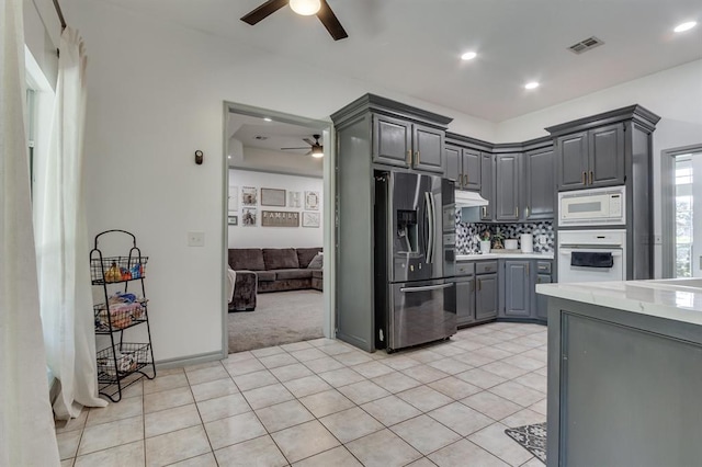 613 N Remington Way, Mustang, OK 73064 - kitchen featuring white appliances, ceiling fan, gray cabinetry, light colored carpet, and recessed lighting