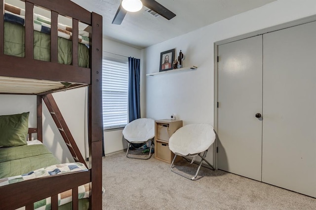 613 N Remington Way, Mustang, OK 73064 - carpeted bedroom with ceiling fan and a closet