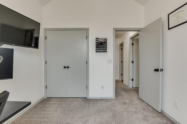 613 N Remington Way, Mustang, OK 73064 - unfurnished bedroom with light colored carpet and a closet