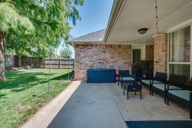 613 N Remington Way, Mustang, OK 73064 - fenced backyard with a patio and outdoor lounge area