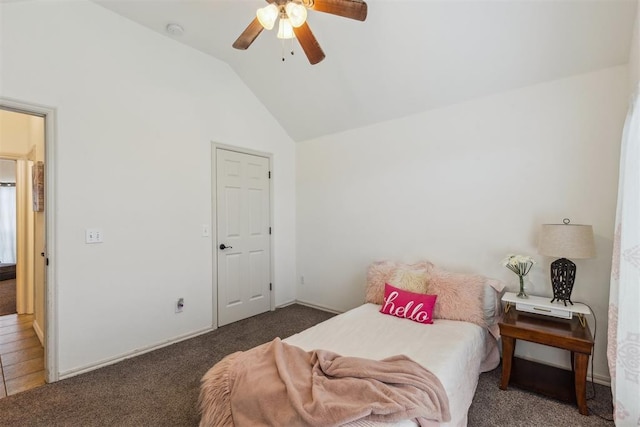 619 SW 28th St, Moore, OK 73160 - carpeted bedroom featuring vaulted ceiling and a ceiling fan
