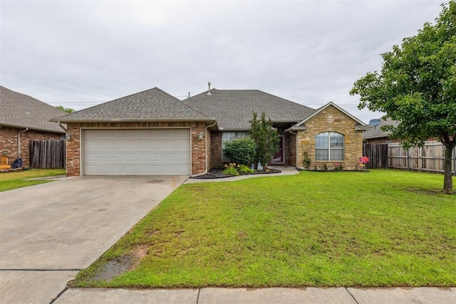 619 SW 28th St, Moore, OK 73160 - view of front of house featuring a garage, driveway, and a shingled roof