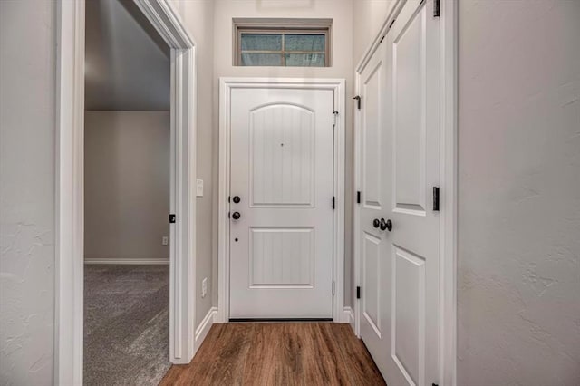 2001 W Crossbow Way, Mustang, OK 73065 - entryway featuring dark wood-type flooring and baseboards