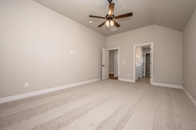 2001 W Crossbow Way, Mustang, OK 73065 - unfurnished bedroom with lofted ceiling, light carpet, ensuite bath, and a ceiling fan