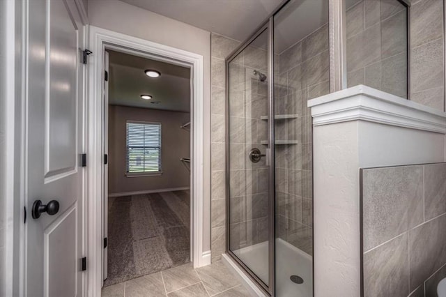2001 W Crossbow Way, Mustang, OK 73065 - bathroom featuring a shower stall and tile patterned floors