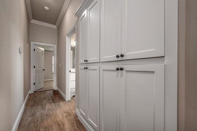 2001 W Crossbow Way, Mustang, OK 73065 - hallway featuring ornamental molding and wood finished floors
