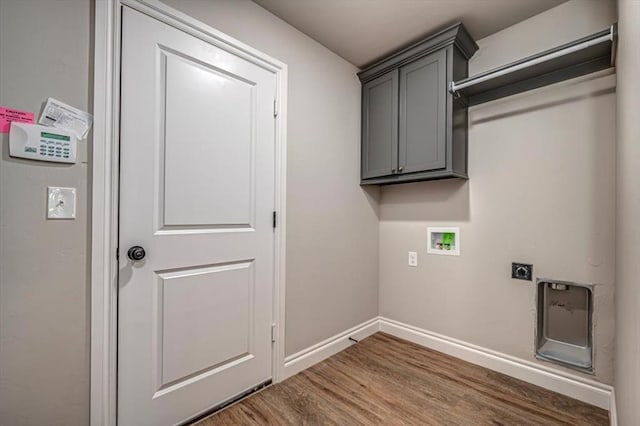 2001 W Crossbow Way, Mustang, OK 73065 - washroom with hookup for a washing machine, electric dryer hookup, and wood finished floors