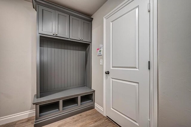 2001 W Crossbow Way, Mustang, OK 73065 - mudroom with wood finished floors and baseboards