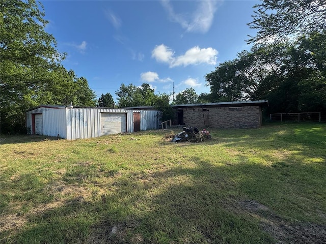 00000 N 3rd Hwy, Seminole, OK 74868 - view of grassy yard with a garage and an outdoor structure