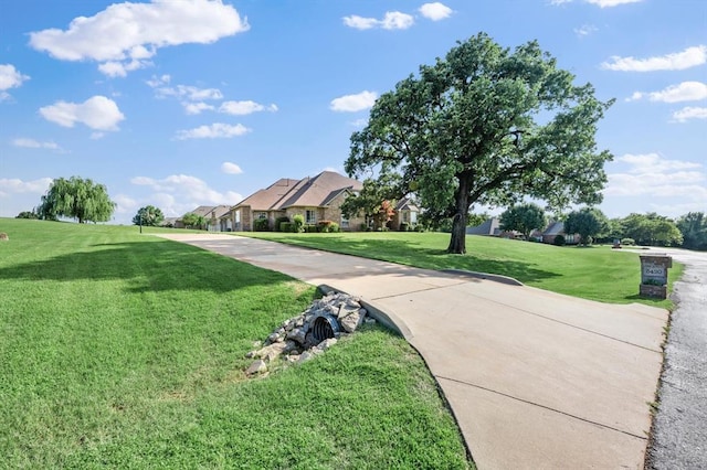 5420 NE 56th St, Oklahoma City, OK 73121 - view of property's community featuring a lawn and a residential view