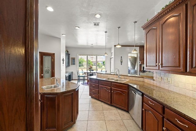 5420 NE 56th St, Oklahoma City, OK 73121 - kitchen featuring stainless steel dishwasher, a peninsula, light tile patterned floors, hanging light fixtures, and stone countertops