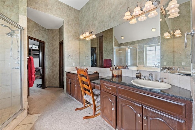 5420 NE 56th St, Oklahoma City, OK 73121 - bathroom with a stall shower, vanity, and a walk in closet