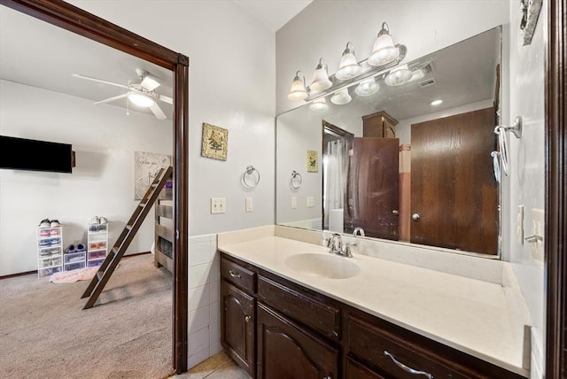 5420 NE 56th St, Oklahoma City, OK 73121 - bathroom featuring vanity and ceiling fan