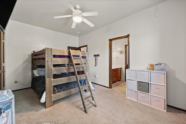 5420 NE 56th St, Oklahoma City, OK 73121 - bedroom featuring light colored carpet, ensuite bath, and a ceiling fan