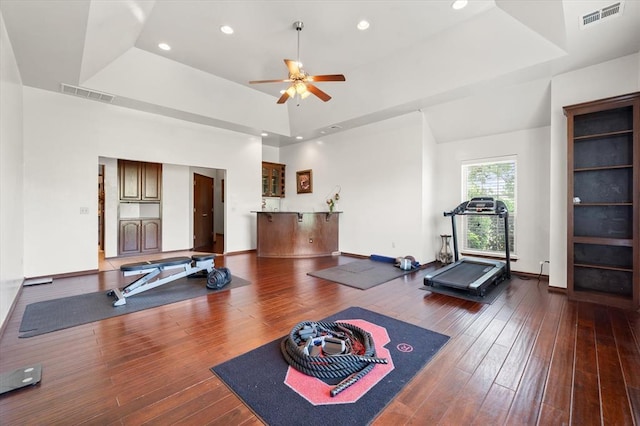 5420 NE 56th St, Oklahoma City, OK 73121 - workout area with a tray ceiling, ceiling fan, wood-type flooring, and recessed lighting