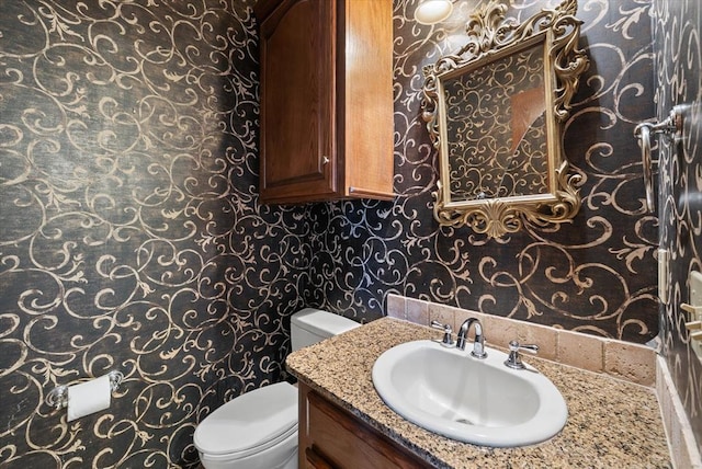5420 NE 56th St, Oklahoma City, OK 73121 - bathroom featuring wallpapered walls and vanity